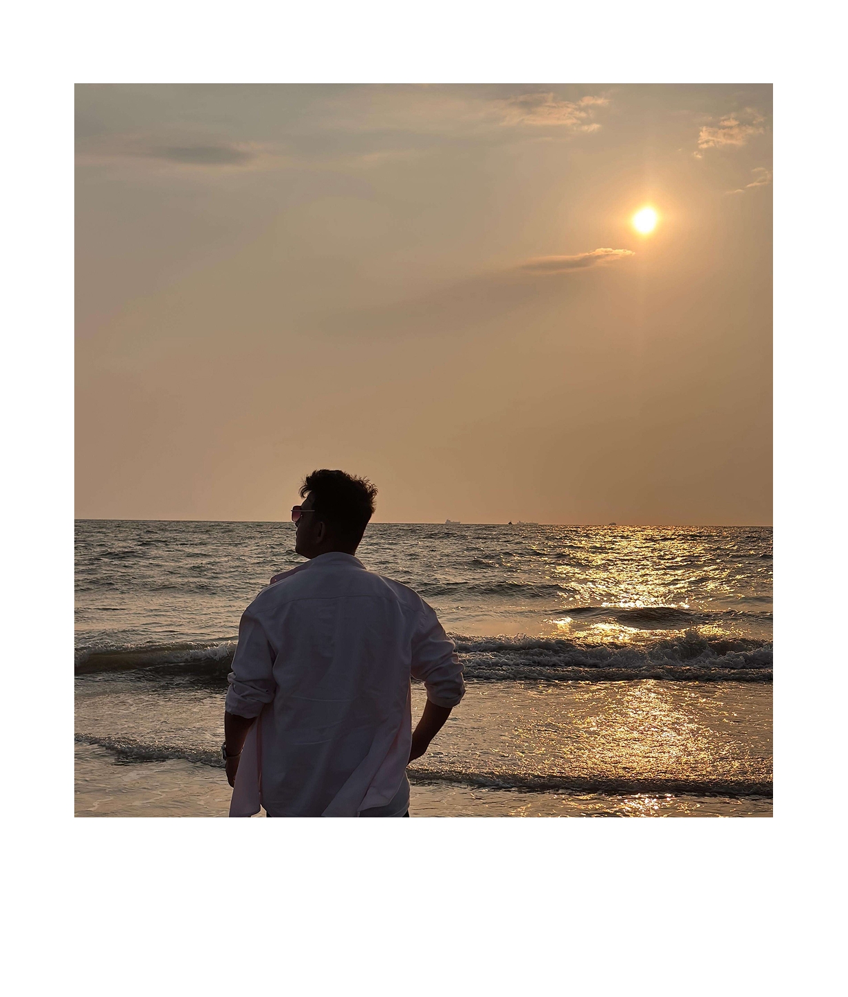 Sambit watching sunset at the beach